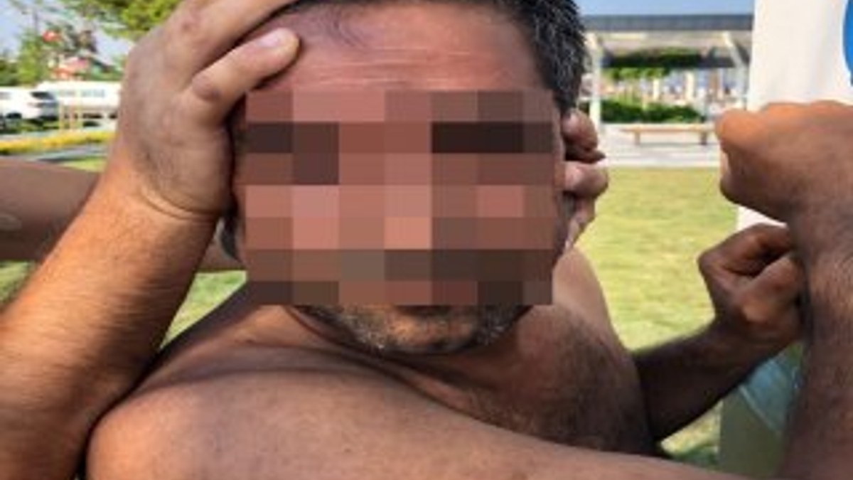 Plajda gizlice kadınları fotoğraflayan şahıs yakalandı