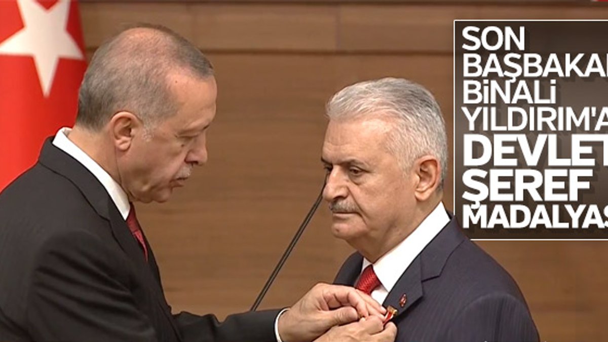 Başkan Erdoğan Binali Yıldırım'a şeref madalyası verdi