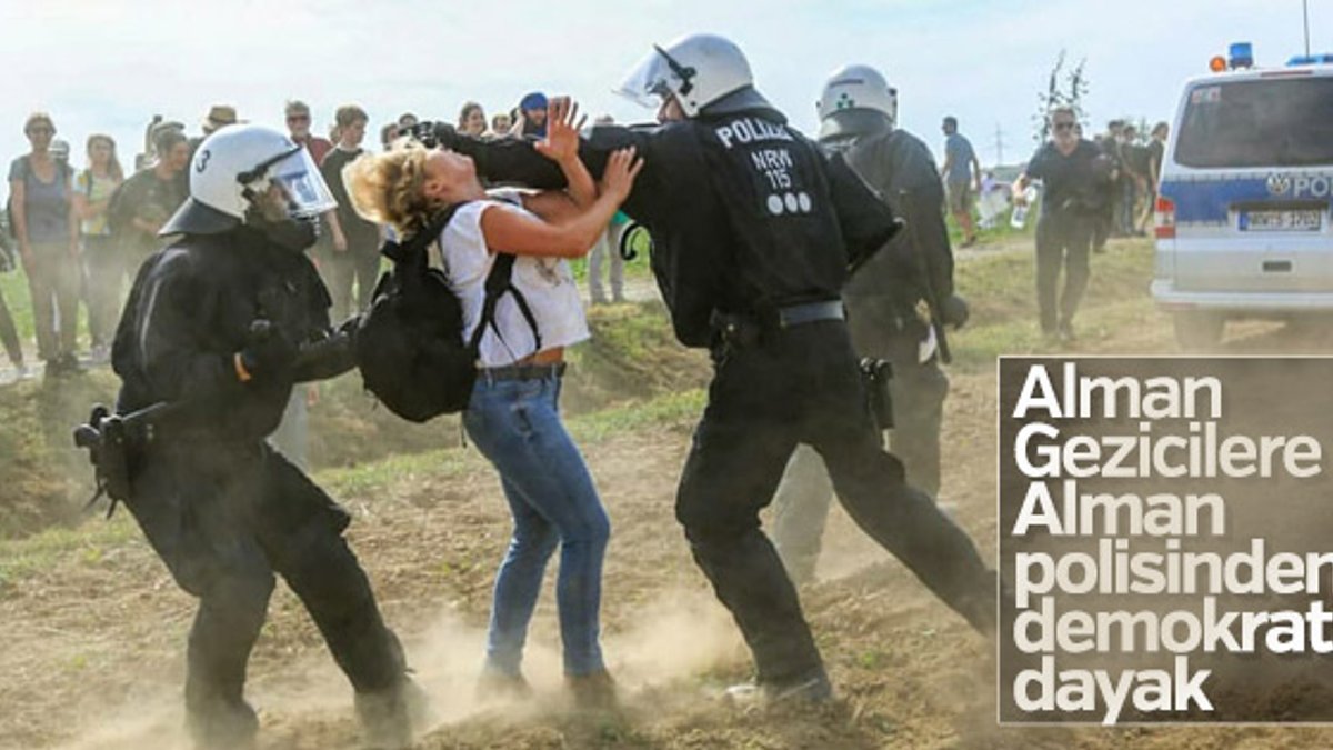 Alman polisinden göstericilere yumruklu dayak