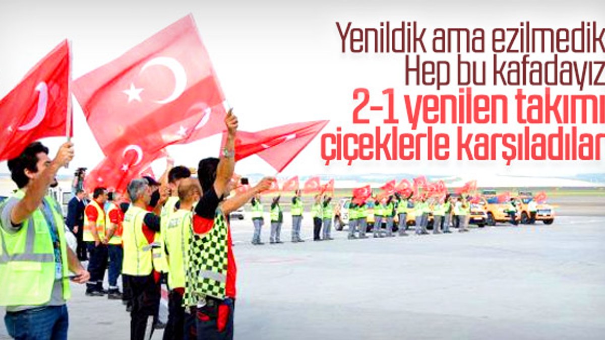 A Milliler İstanbul Havalimanı'nda çiçeklerle karşılandı