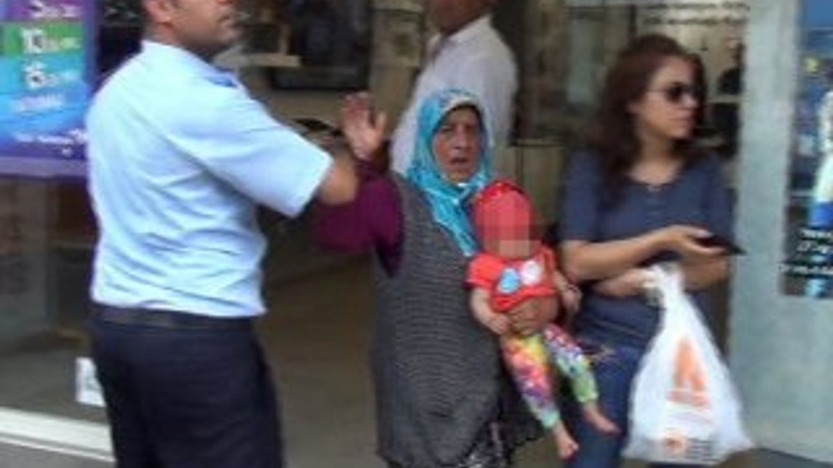 Polise yakalanan dilenci kadın bebeğiyle tehdit etti