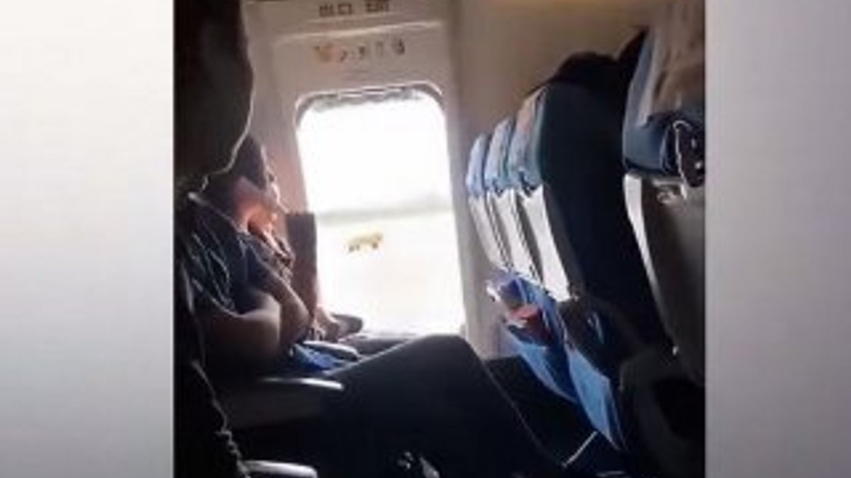 Çin'de yolcu, uçağın acil çıkış kapısını açtı
