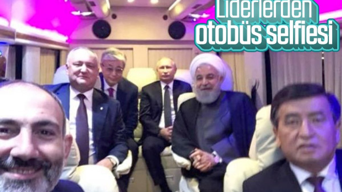 Putin ve Ruhani'den otobüste selfie