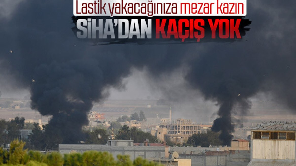 YPG'li teröristler SİHA'lara karşı lastik yakıyor