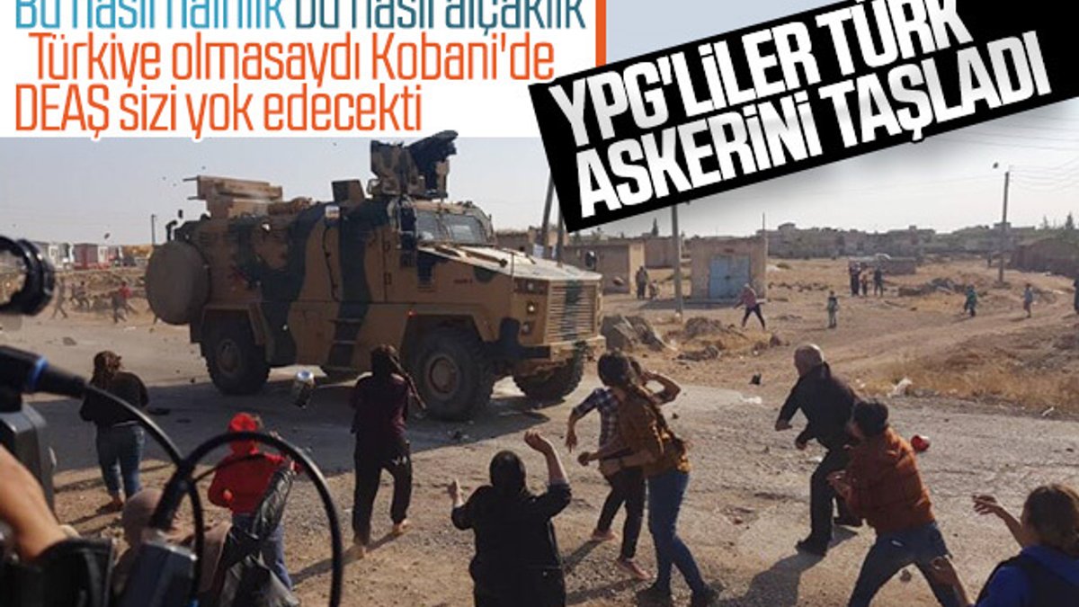 Kobani'de YPG'liler Türk askerini taşladı