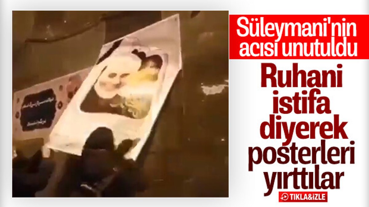 İranlılar Süleymani'nin posterlerini yırttı