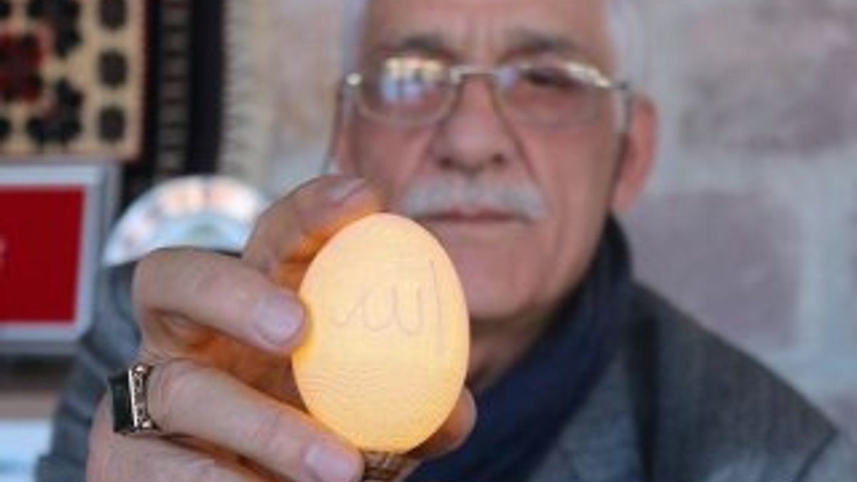 Yumurta kabuğuna 11 bin 827 delikle sanatını işledi