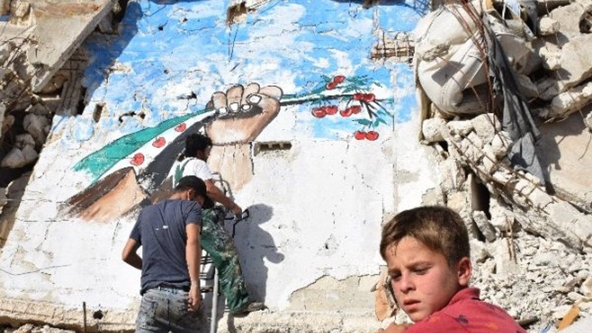 Suriye'de savaşın izleri sanatla silinmeye çalışılıyor