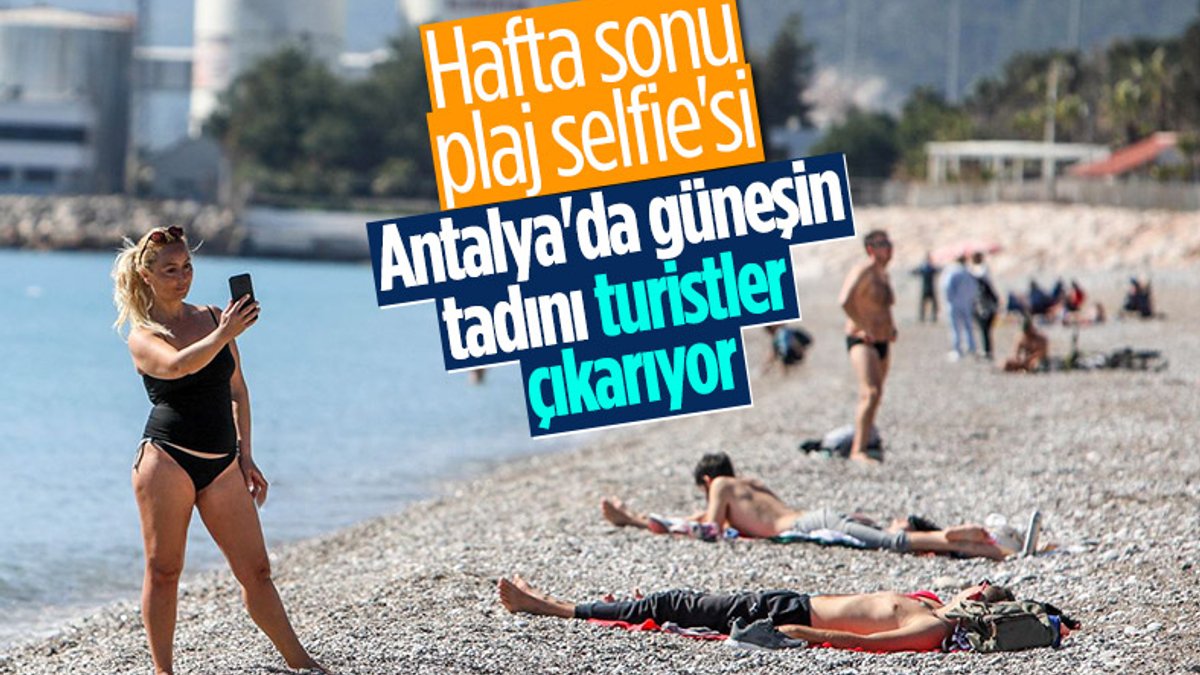 Antalya'da turistler sahile indi