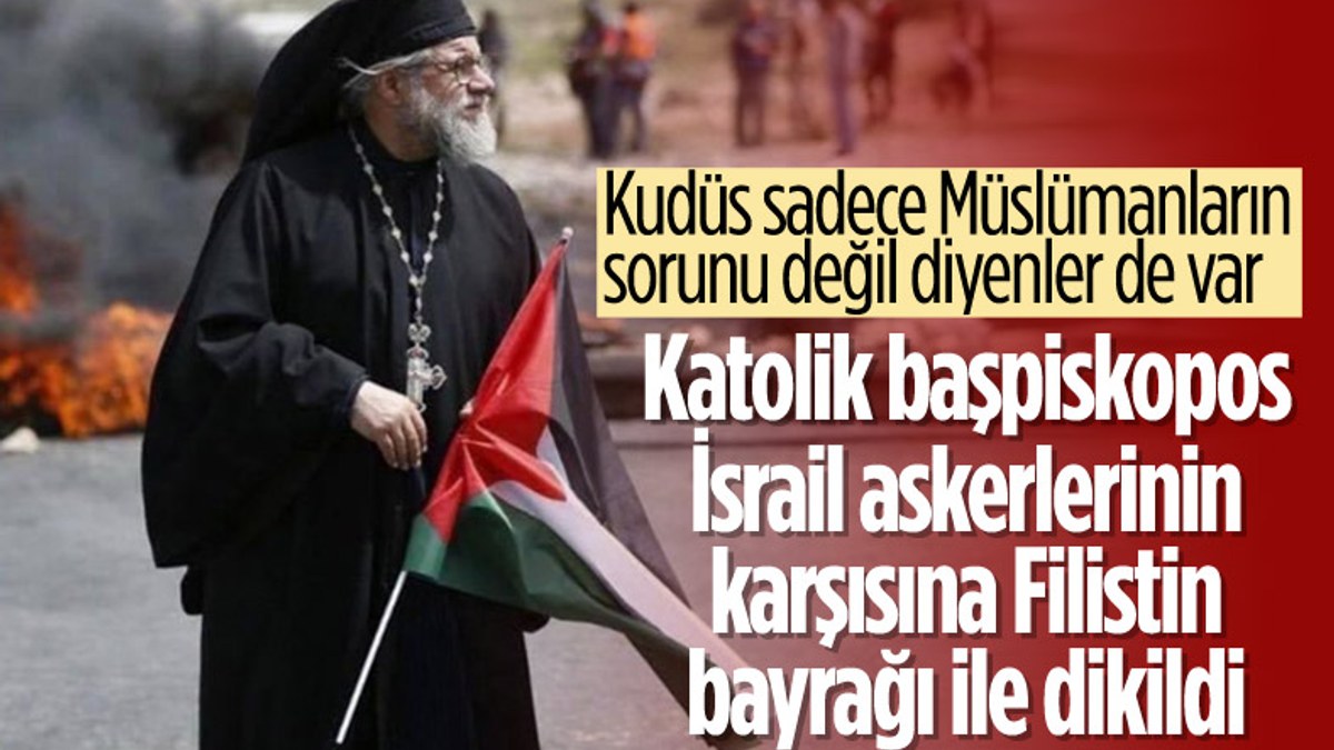 Katolik Başpiskopos Yulio, Filistin bayrağı ile İsrail askerlerinin karşısına çıktı