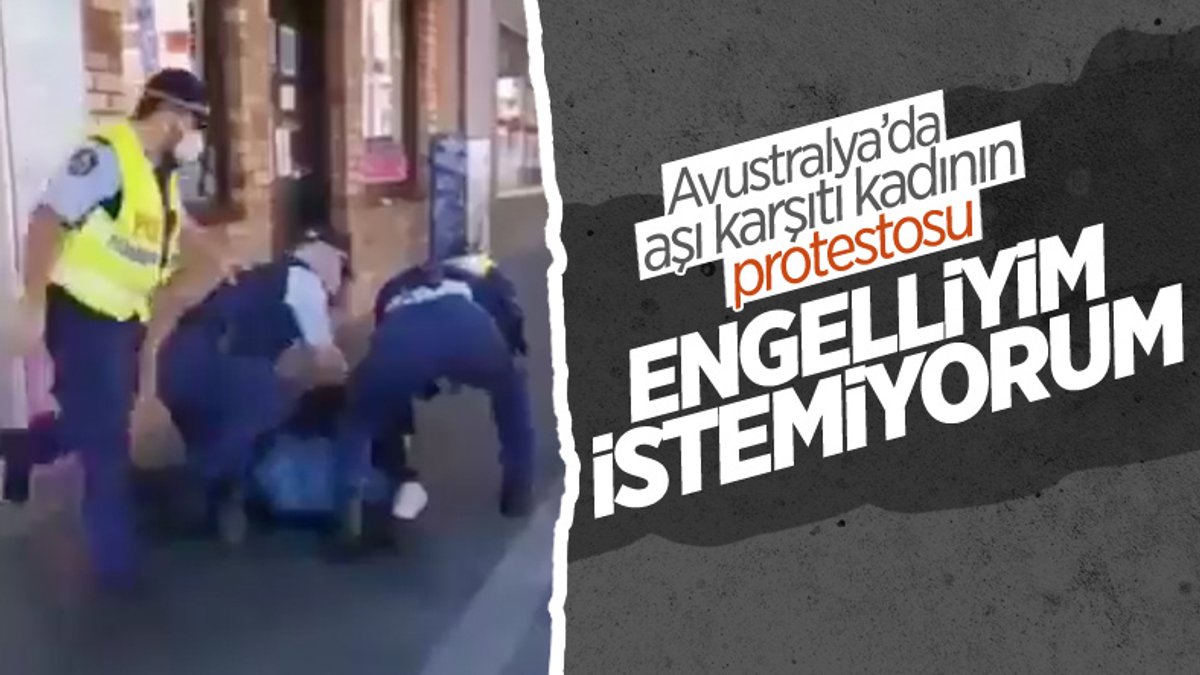 Avustralya'da aşı karşıtı protesto yapan kadına polis müdahalesi