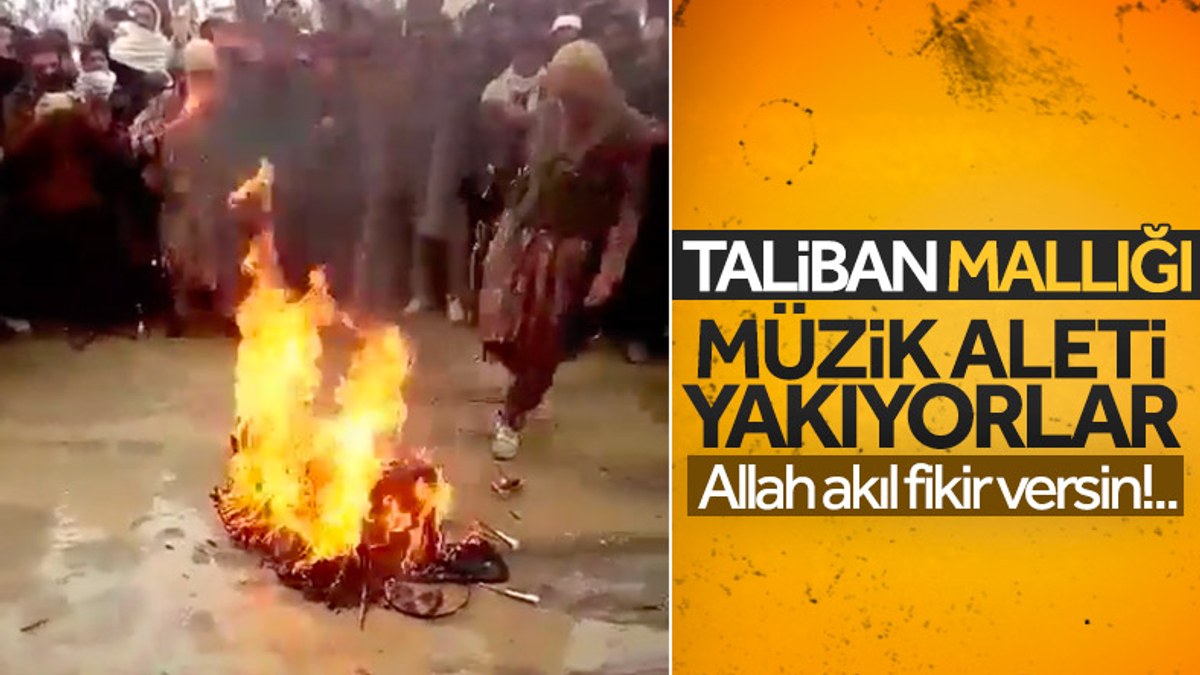 Taliban üyeleri bir müzisyenin enstrümanını yaktı