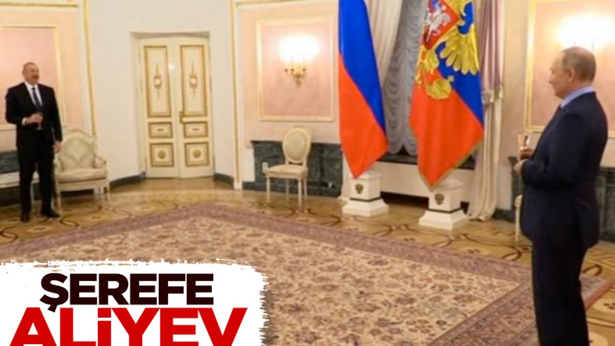 Aliyev ile Putin, iş birliği bildirgesini şampanya ile kutladı