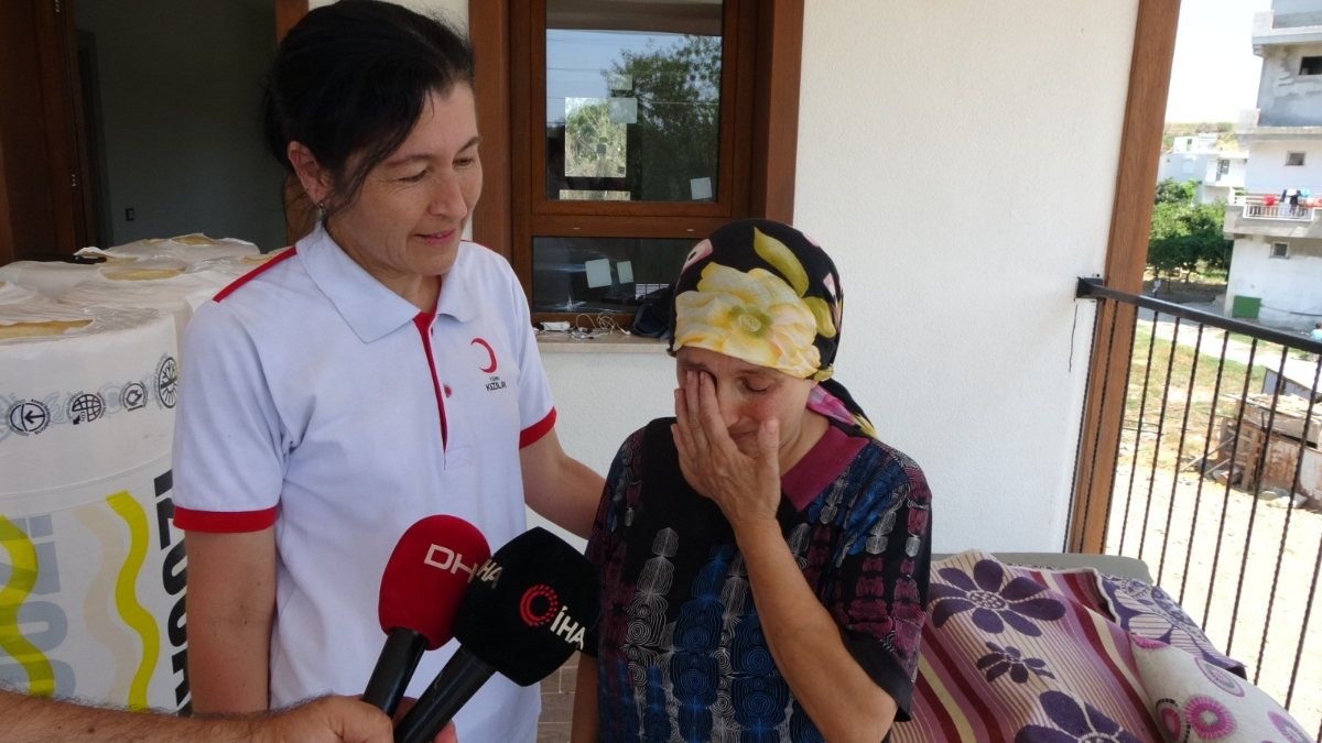 Antalya'da yangınzede kadın gözyaşlarıyla yeni evine kavuştu