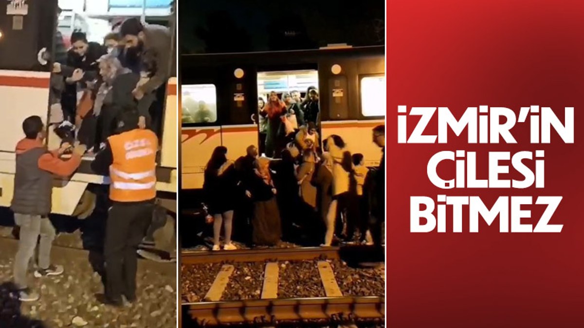 İzmir'de İZBAN arızalanınca vatandaşlar raylardan istasyona yürüdü