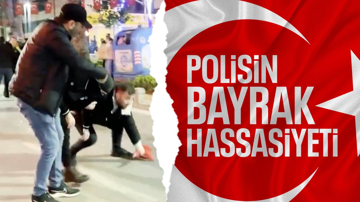 Kocaeli’de polis memuru eylemcilerin düşürdüğü bayrağı kaldırdı
