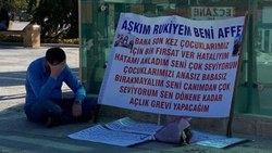 Kırşehir'de terk edildiği eşi için pankart açtı