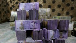 Esad, Suriye lirasını yüzde 50 devalüe etti