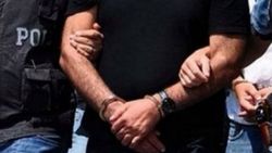 FETÖ'den aranan baba-oğul oy kullanırken yakalandı