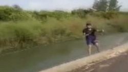 Sulama kanalında sörf yapan Adanalı