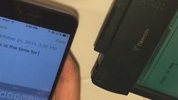 Apple Newton ile iPhone 6 karşı karşıya - İzle