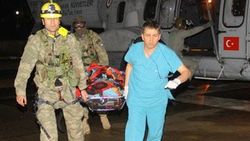 Kayalıklardan düşen kadın askeri helikopterle kurtarıldı