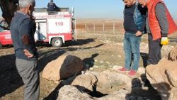Mardin'de kuyuya düşen köpeği itfaiye ekipleri kurtardı