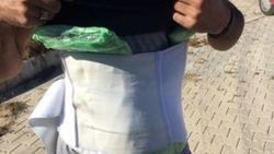 Beline sardığı 1 kilo 660 gram esrar ile yakalandı