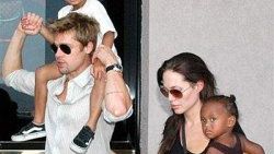 Angelina geziyor Brad ev işlerini yapıyor