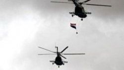 Suriye'de helikopterler iki kasabayı bombalıyor