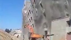 Çin'de kontrolsüz bina yıkımı kameralara yansıdı