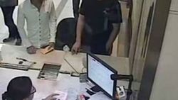 Çinli adam bankada cüzdanını çalan hırsızla karşılaştı