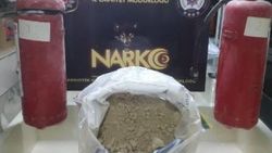 Tırdaki yangın söndürücülerden 11 kilo eroin çıktı