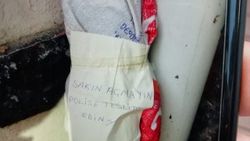 Binanın önüne 5 el bombası ve lav silahı bırakıldı