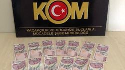 Polisi görünce sahte paraları atıp kaçmaya çalıştı