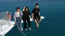 Çinli turistlerin Antalya'da deniz keyfi
