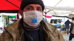 Tokat'ta sigara tiryakisinin maskeye sigara çözümü
