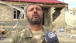 Ermenistan'ın saldırısında ailesini kaybeden asker cepheye gideceği günü bekliyor