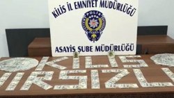 Kilis'te otomobilden döviz çalan şüpheli tutuklandı