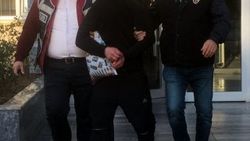 Çarşafla hastaneye girmeye çalışırken gözaltına alındı