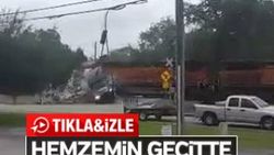 Hemzemin geçitte sıkışan TIR'ı tren biçti