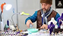 Tarihi mekanları yüzüklere işliyor