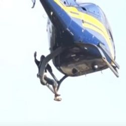 İş için eski Başbakan'ın helikopterine asıldı, tutuklandı