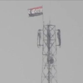 YPG/PKK, Tel Rıfat'ta rejim bayrağını dalgalandırıyor