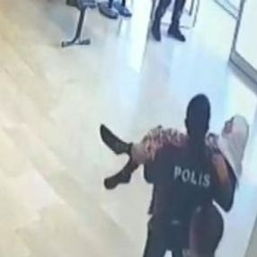 Mardin'de yaşlı kadını kucağında taşıyan polis