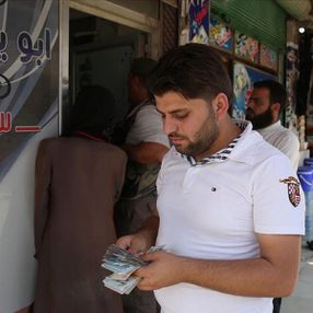 Suriye'nin bazı bölgelerinde TL'ye geçiş yapıldı