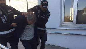 KKTC'de yakalanan müteahhit Hasan Alpargün Adana'ya getirildi