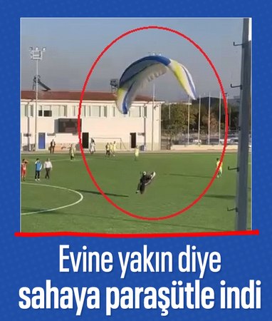 Bursa'da futbol sahasına paraşütle indi