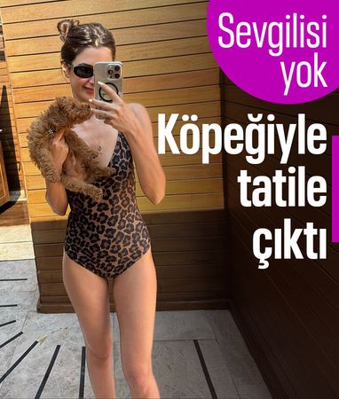 Nesrin Cavadzade köpeğiyle tatilde
