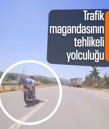Samsun'da tehlikeli yolculuk: Motosikletin üzerine yatarak trafikte ilerledi